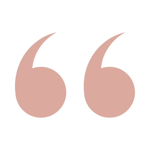 Quote icon in a pink colour.